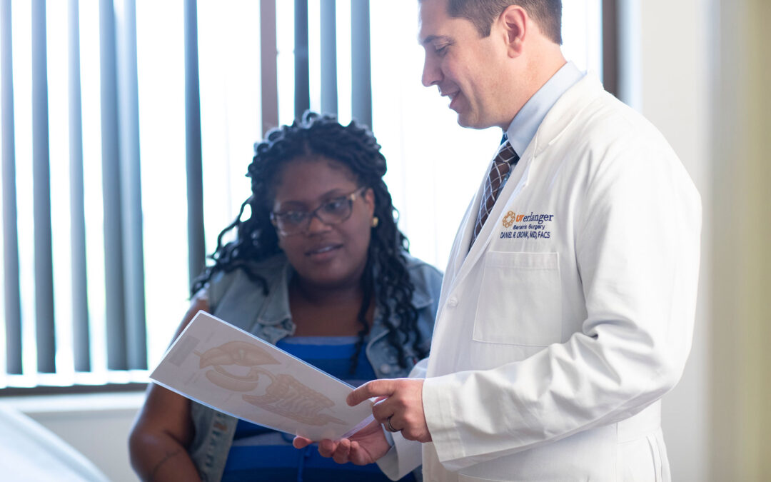 Dr. Cronk with patient in bariatric surgery consultation