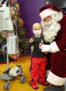 Children’s Hospital at Erlanger patient, Gabriel Singleton, age 3, from Dalton, Ga., visits with Santa.
